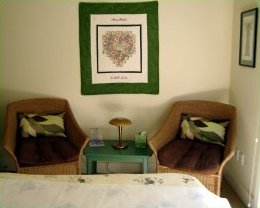 Treatment room: hanging quilt and a calming atmosphere